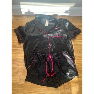 black satin short-sleeve pajama set with hot pink contrast piping